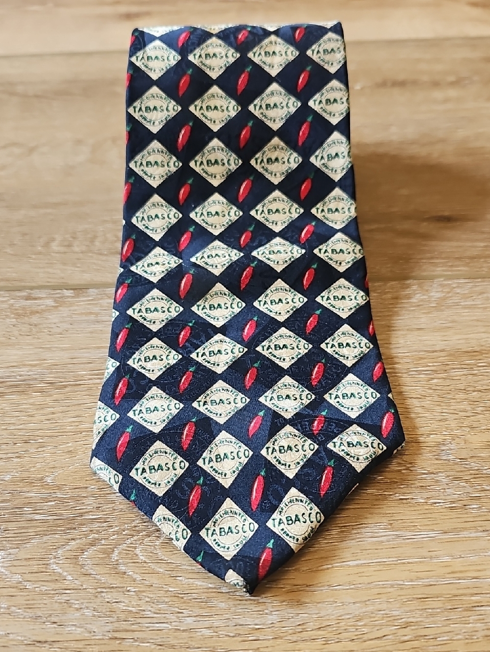 Tabasco Navy Tie with Red and Cream Logo Diamonds